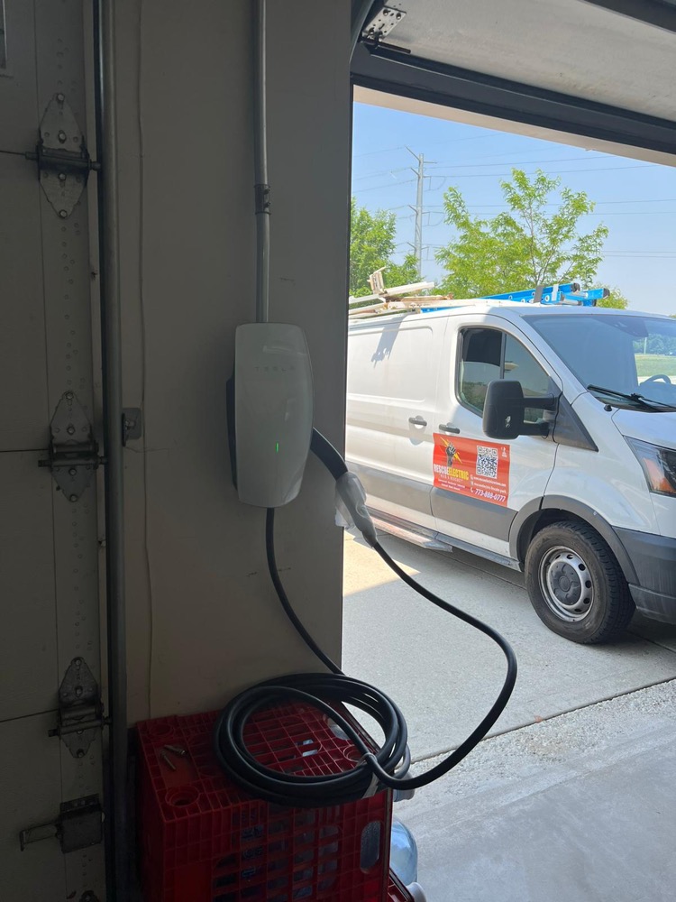 EV charger installation with Rescue Electric van on site