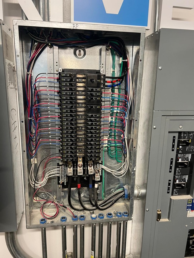 New electrical panel with professionally organized wiring installed by Rescue Electric